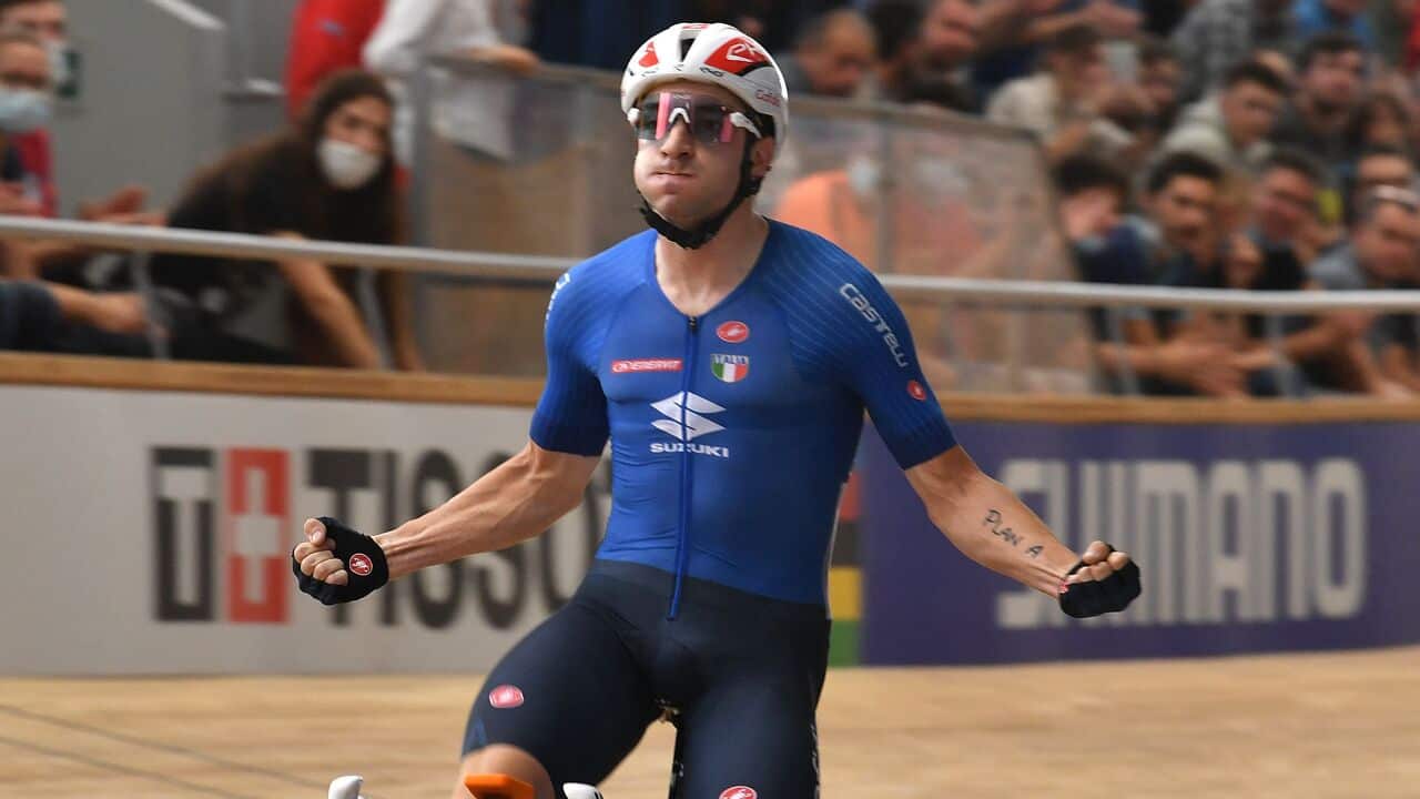 Italy's Elia Viviani celebrates winning in the elimination race during the UCI Track Cycling World Championships
