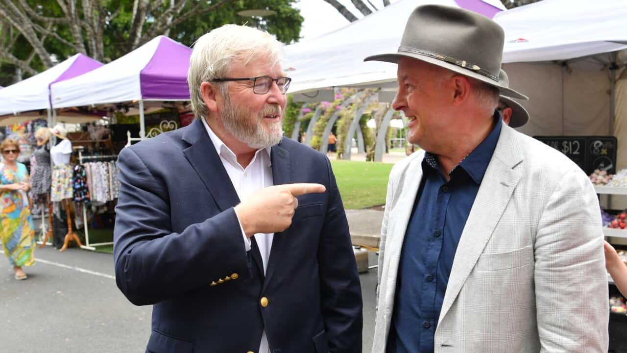 Former Australian Prime Minister Kevin Rudd (left) and Australian Opposition Leader Anthony Albanese (right) are seen touring the Southbank Collective Markets in Brisbane, Saturday, February 6, 2021.