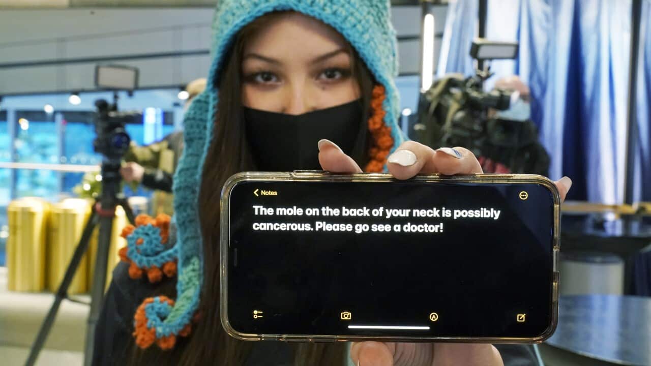 Seattle Kraken fan Nadia Popovici poses for a photo before an NHL hockey game between the Kraken and the Vancouver Canucks.