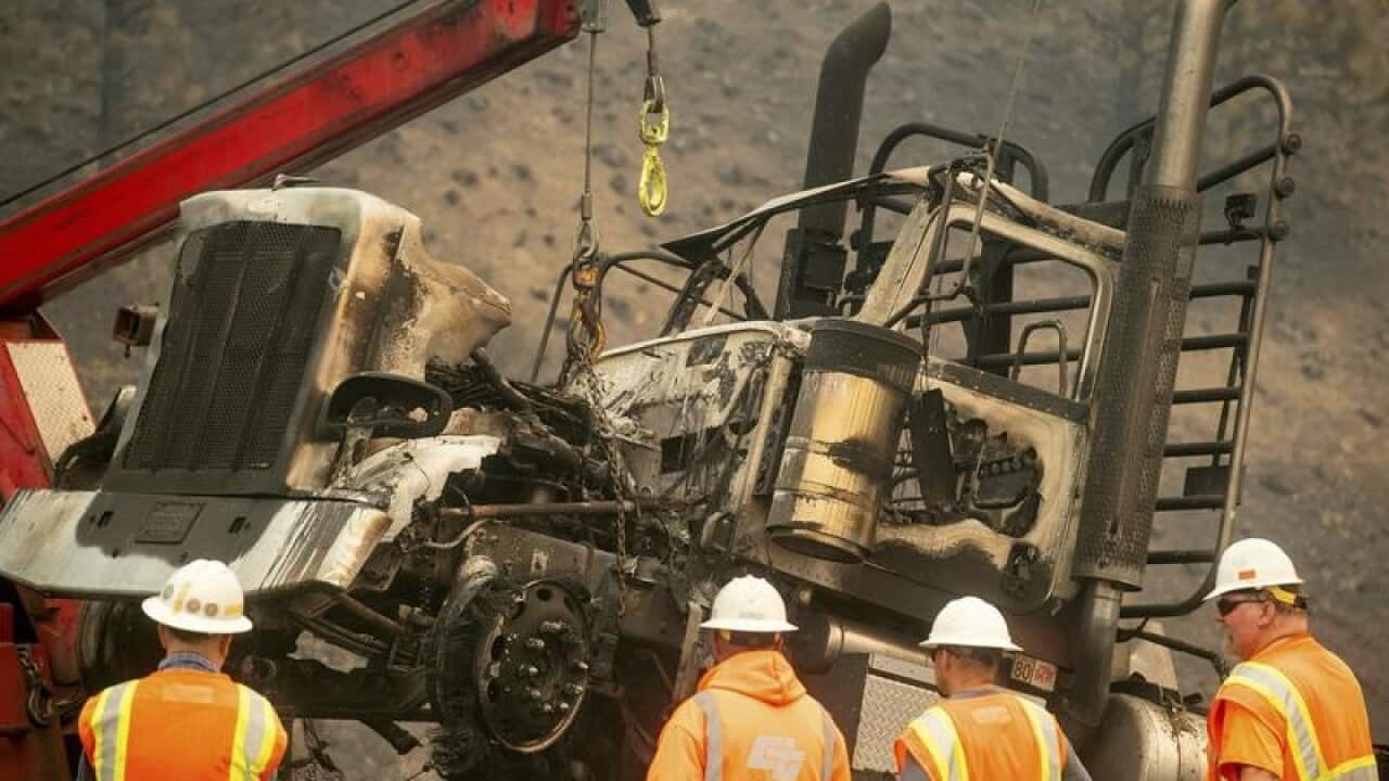 Burnt out trucks on Interstate 5, California.