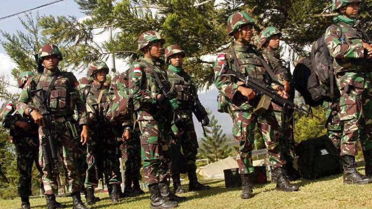 Indonesian military troops prepare to be deployed to Nduga district where suspected separatists shot dead dozens of workers at a field in Wamena, Papua.