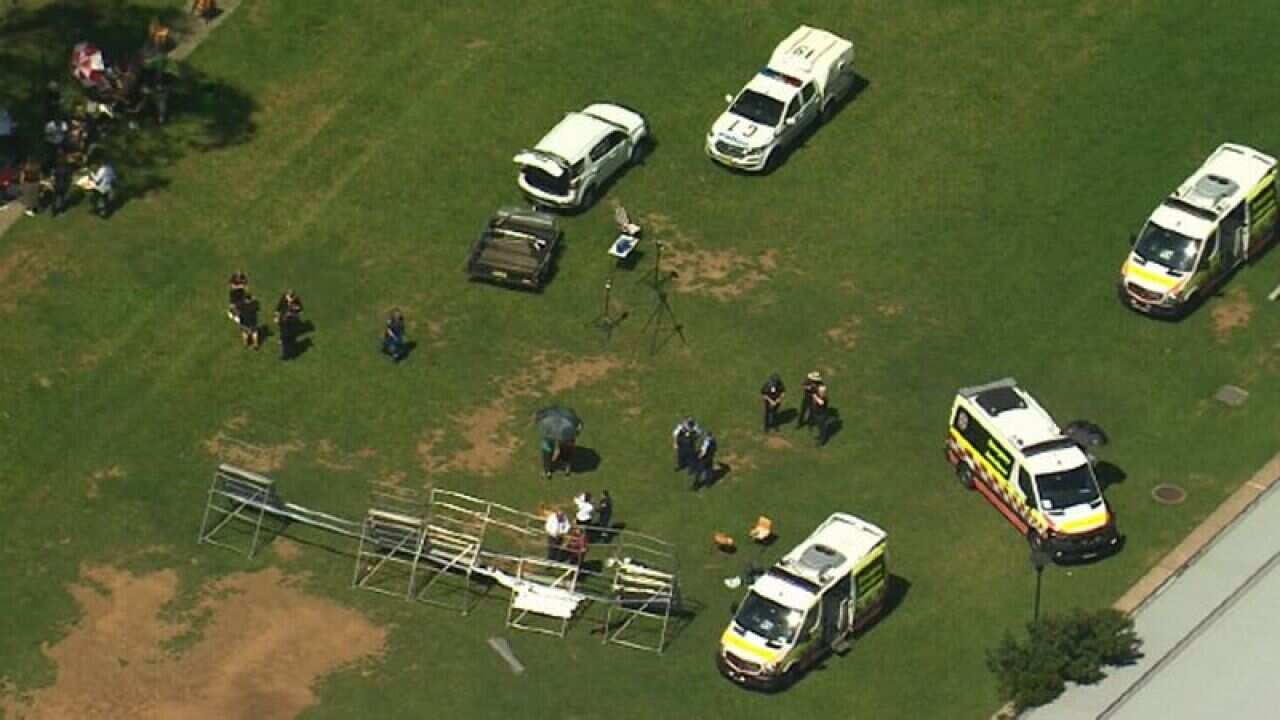 Students injured after scaffolding collapsed during photo session in Sydney school