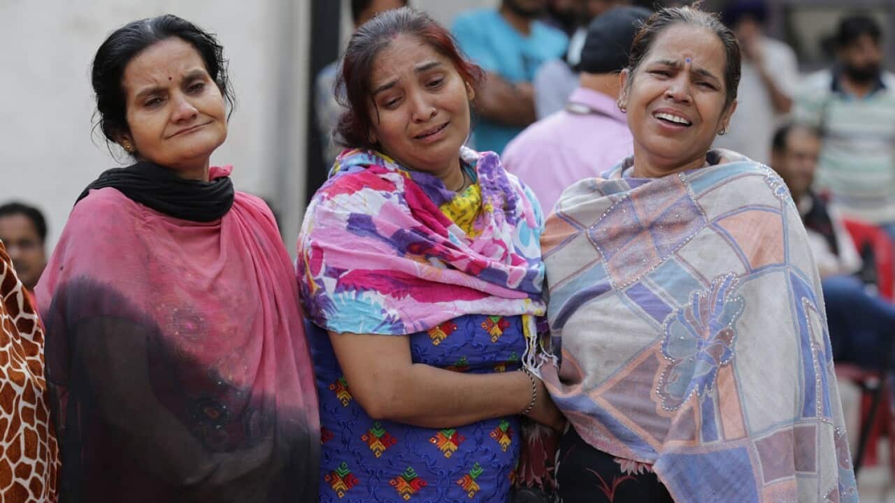 Relatives of the victims of the train disaster in Amritsar, India.