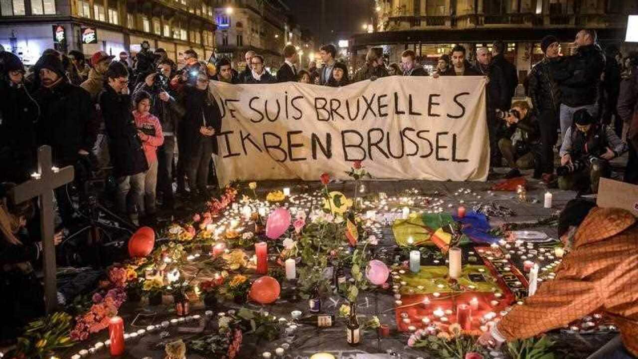 Bourse square to pay tribute to the victims of the terror attacks that occured earlier in the day, in Brussels, Belgium, 22 March 2016.