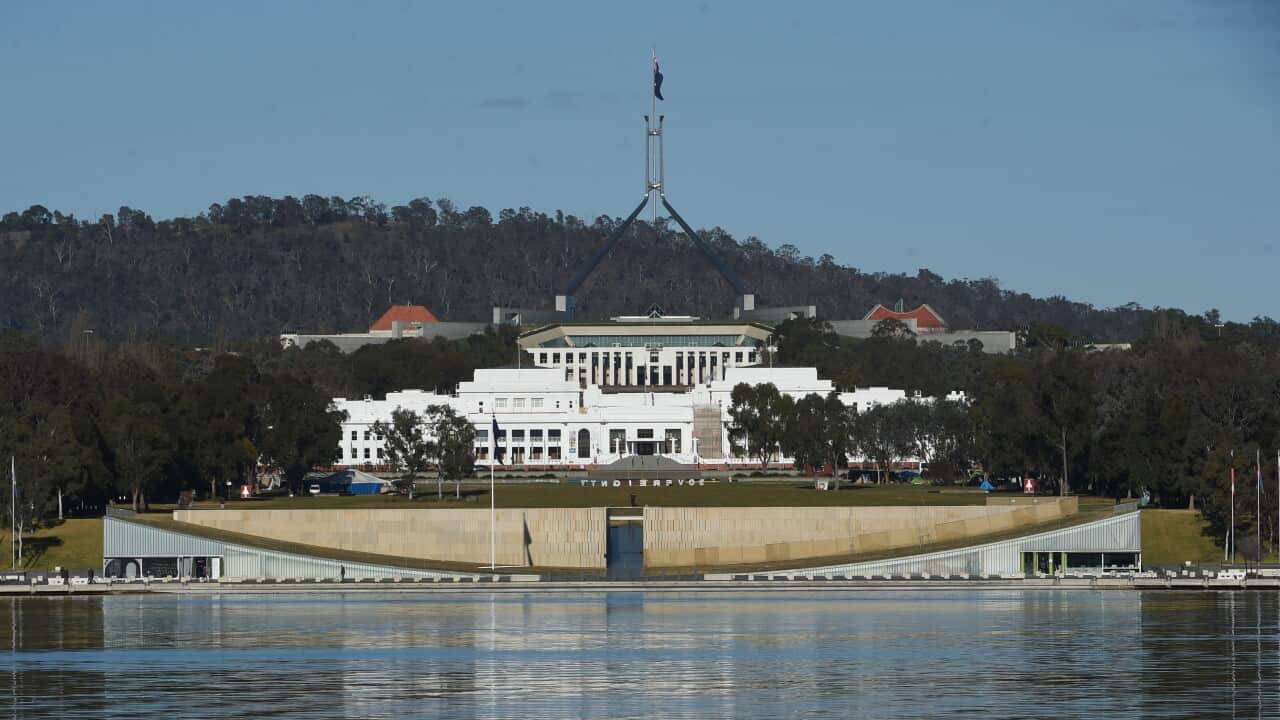 Old Parliament House and Parliament House are seen in Canberra