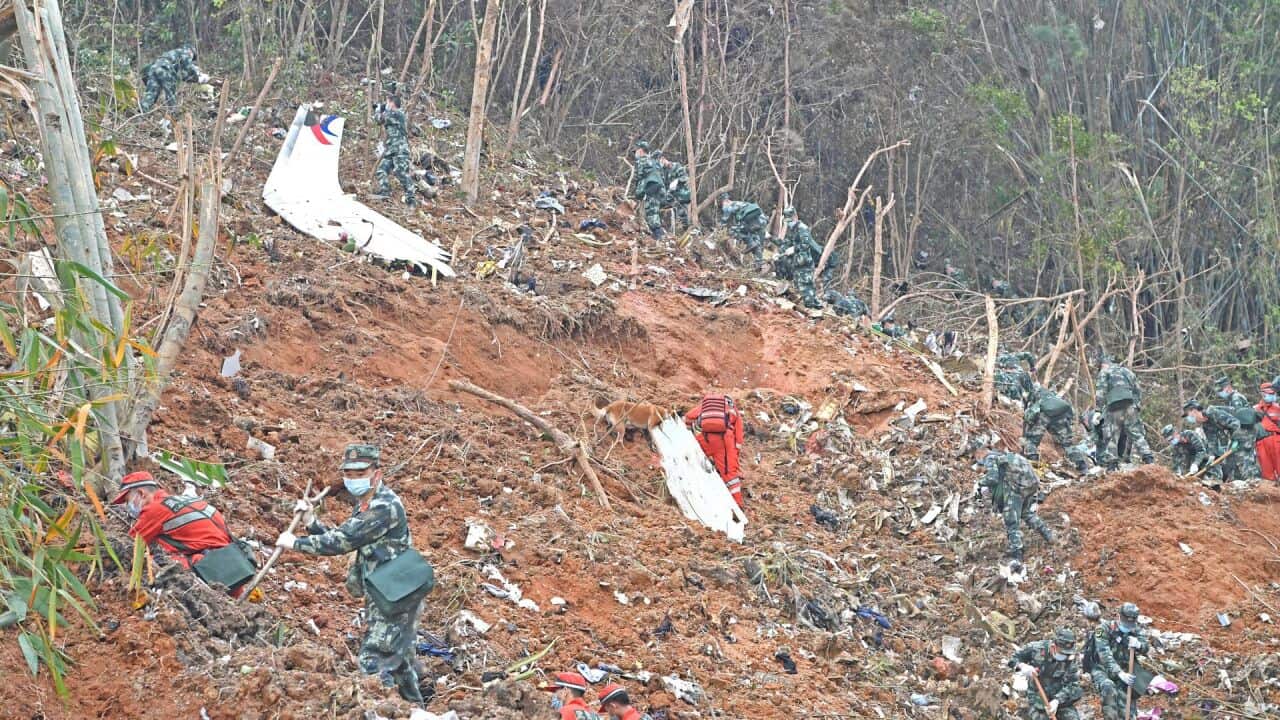 Rescuers search for the black boxes at a plane crash site in Tengxian county of Wuzhou, Guangxi Zhuang Autonomous Region, China March 22, 2022.