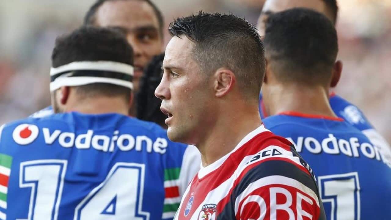 Roosters halfback Cooper Cronk reacts after conceding a try