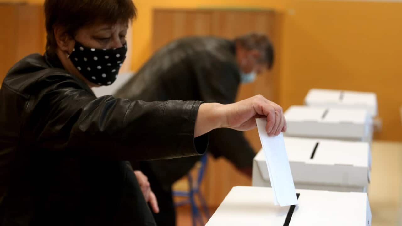 ZAGREB, CROATIA - MAY 16: People cast their votes at a polling station during 2021 Croatian local elections amid the coronavirus (Covid-19) pandemic in Zagreb, Croatia on May 16, 2021.