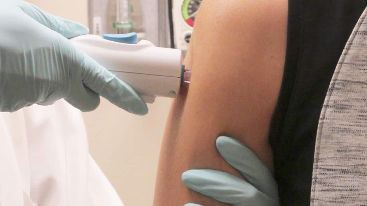 Volunteer receiving the NIAID Zika virus investigational DNA vaccine