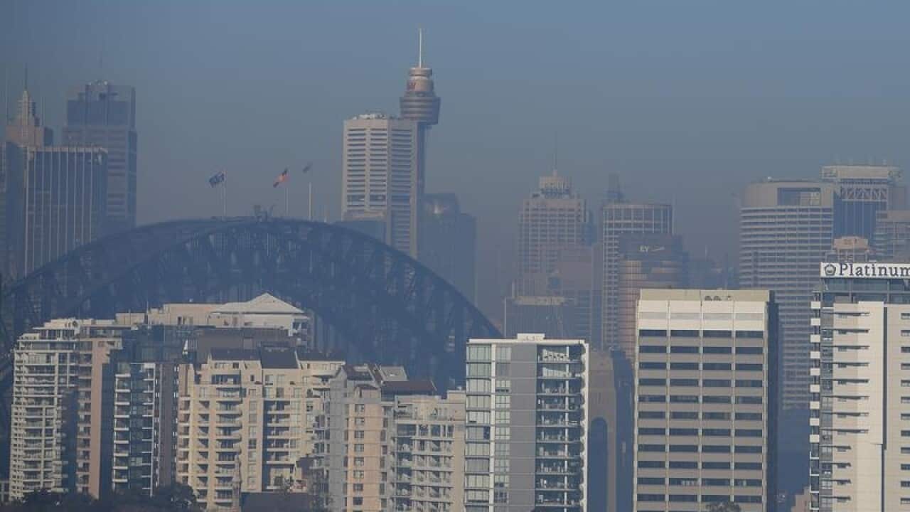 Smoke is seen blanketing the Sydney city skyline.