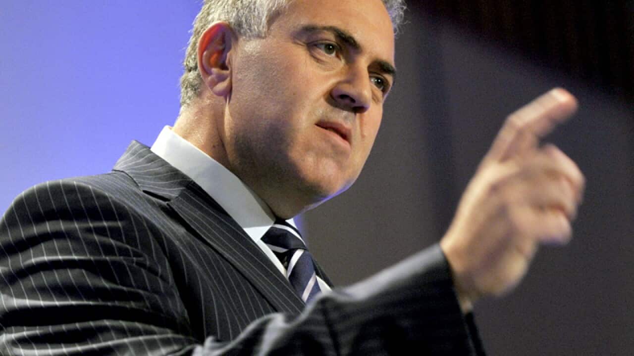 Hockey hiding his spending cut plans: Wong