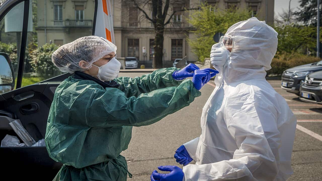 Health workers in Milan are working around the clock.