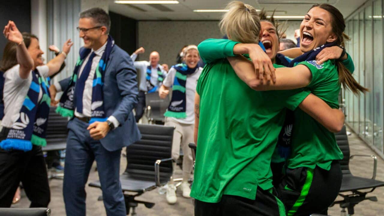 Australian soccer players Steph Catley, Alanna Kennedy and Lydia Williams react as FIFA announced Australia as the hosts to the 2023 FIFA Women's World Cup.