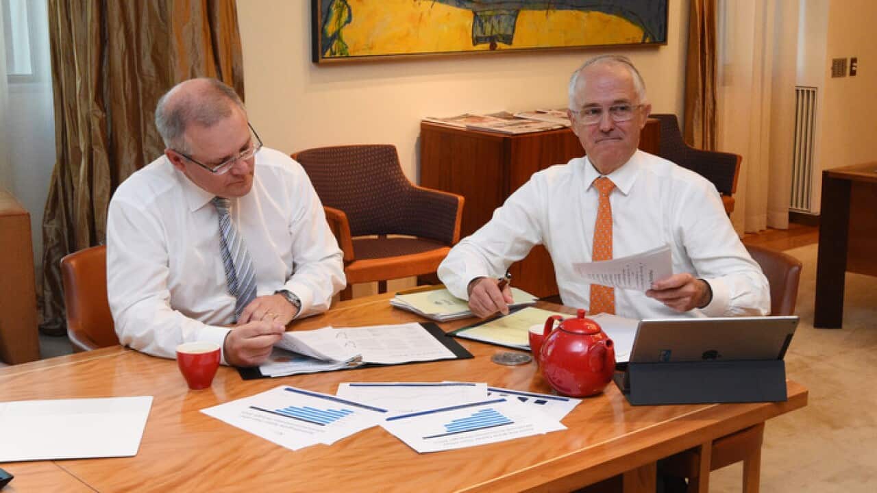 Treasurer Scott Morrison (L) and Prime Minister Malcolm Turnbull