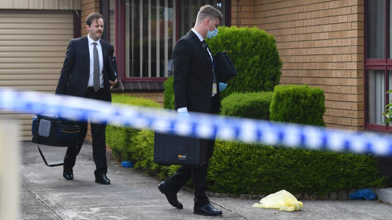 Victorian Police detectives arrive to a crime scene at a property in Tullamarine, Melbourne, Friday, January 15, 2021. A man is speaking with homicide detectives after four people were found dead at a home in Melbourne's northwest.