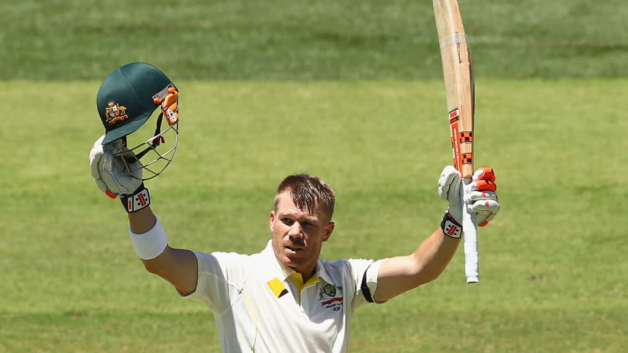 David Warner of Australia celebrates making his century during day one of the First Test match between Australia and India at Adelaide Oval on December 9, 2014 (Getty)