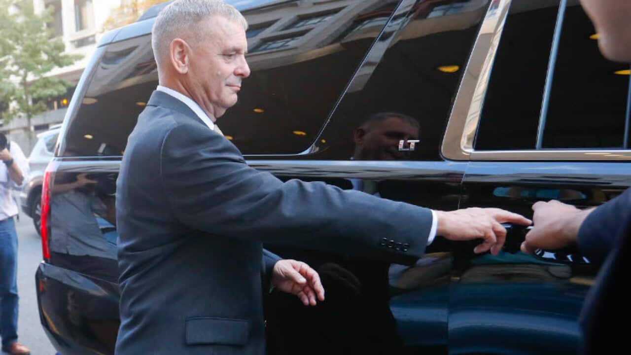 Retired Marine Gen. James Cartwright opens the door to his vehicle as he leaves US District Court in Washington, Monday, Oct. 17, 2016. Cartwright has been charged with making false statements during a federal investigation into leak of classified informa