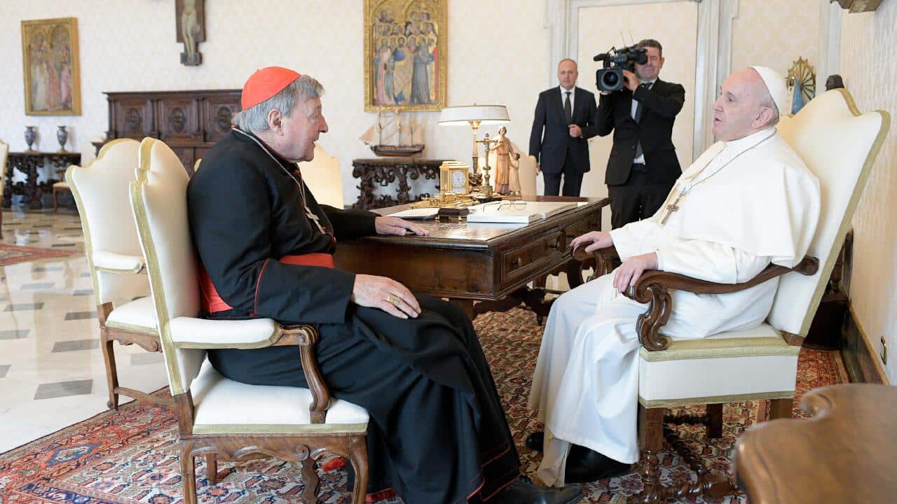 Pope Francis meets with George Pell at the Vatican.