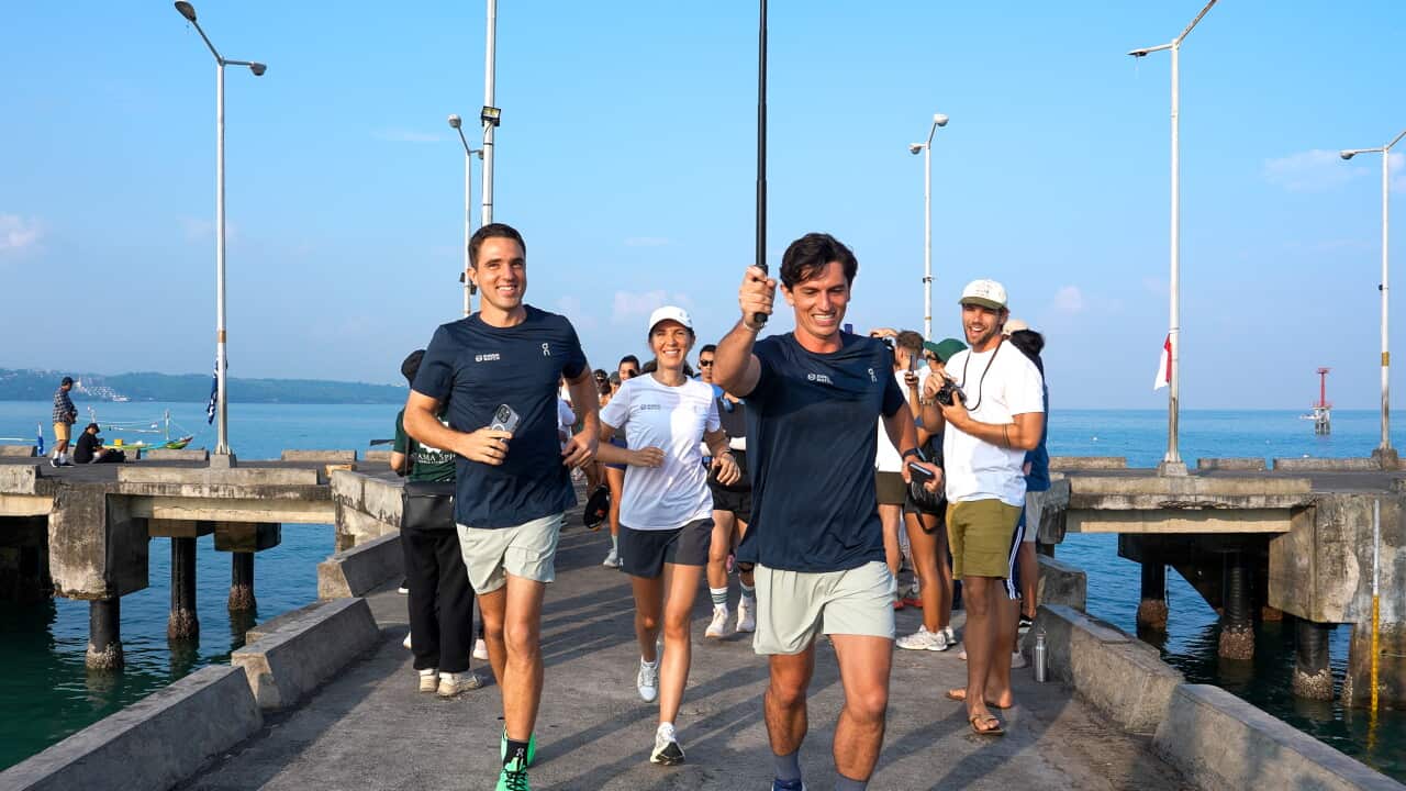 Gary Bencheghib (L), Kelly Bencheghib (C) and Sam Bencheghib (R) during their 1,200-kilometre run from Bali to Jakarta.