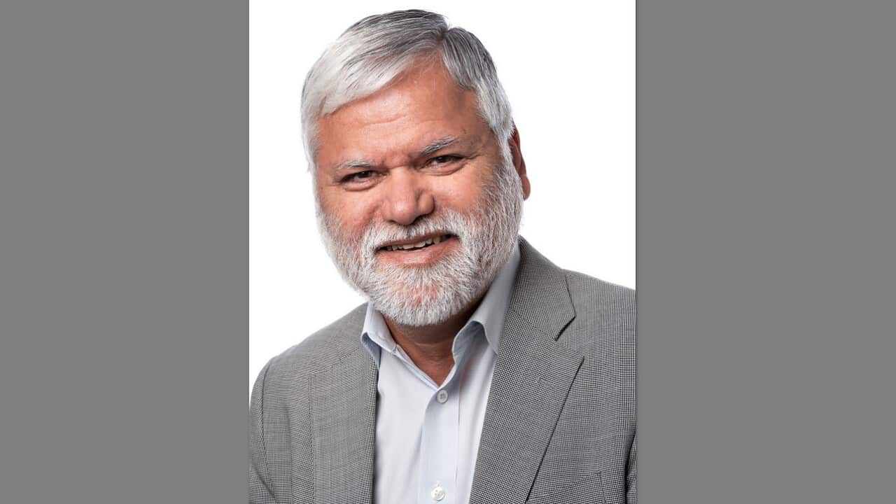 Dr Pradeep Taneja