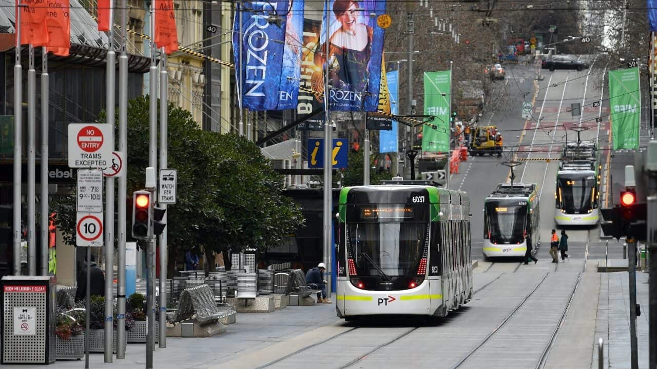 Trams pictured along Bourke Street in Melbourne on 23 July, 2021.