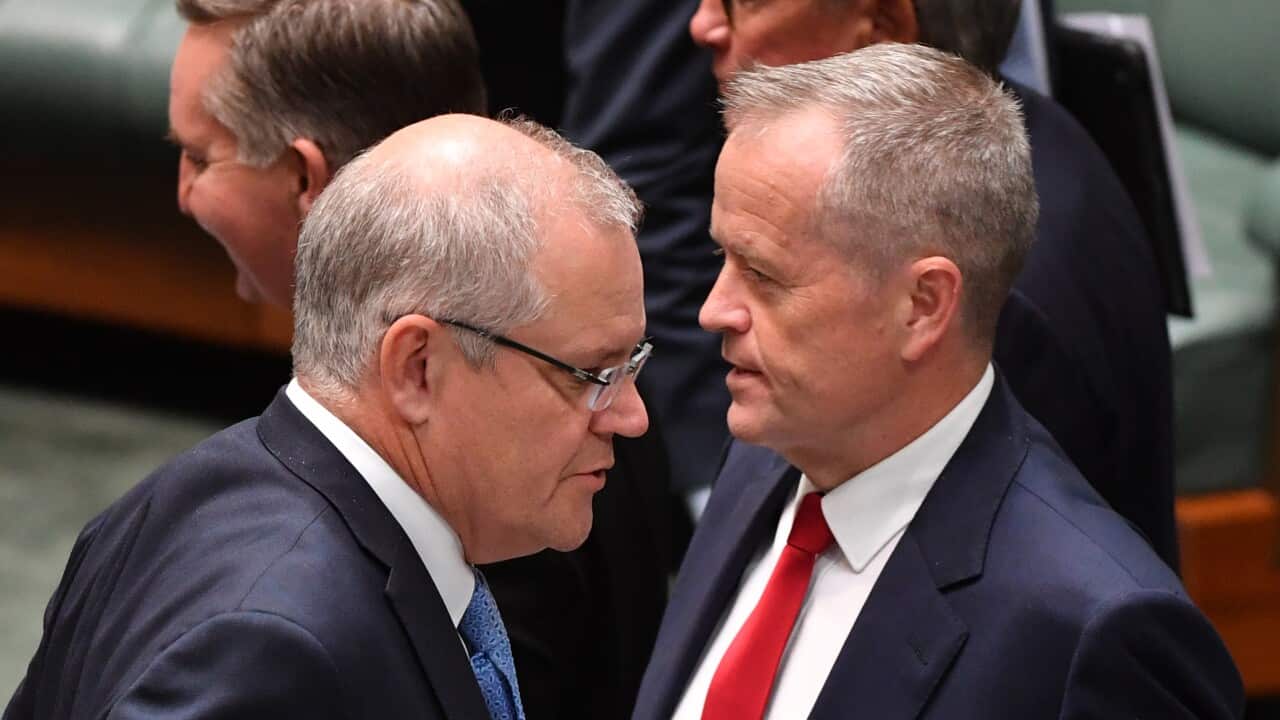 Prime Minister Scott Morrison and Leader of the Opposition Bill Shorten during division in the House of Representatives at Parliament House in Canberra, Thursday, December 6, 2018.