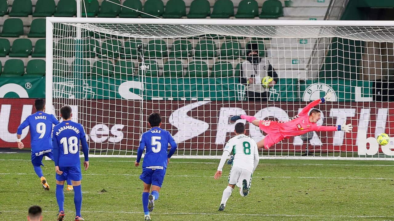 Getafe's Angel (L) scores the 1-3 lead during the Spanish La Liga soccer match between Elche CF and Getafe in Spain,