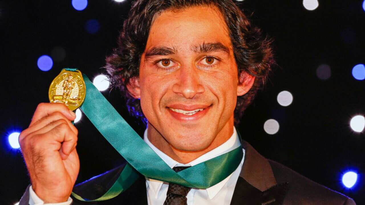 Johnathan Thurston with his 4th Dally M award