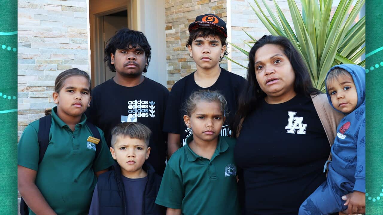 Narkle family together outside their rental