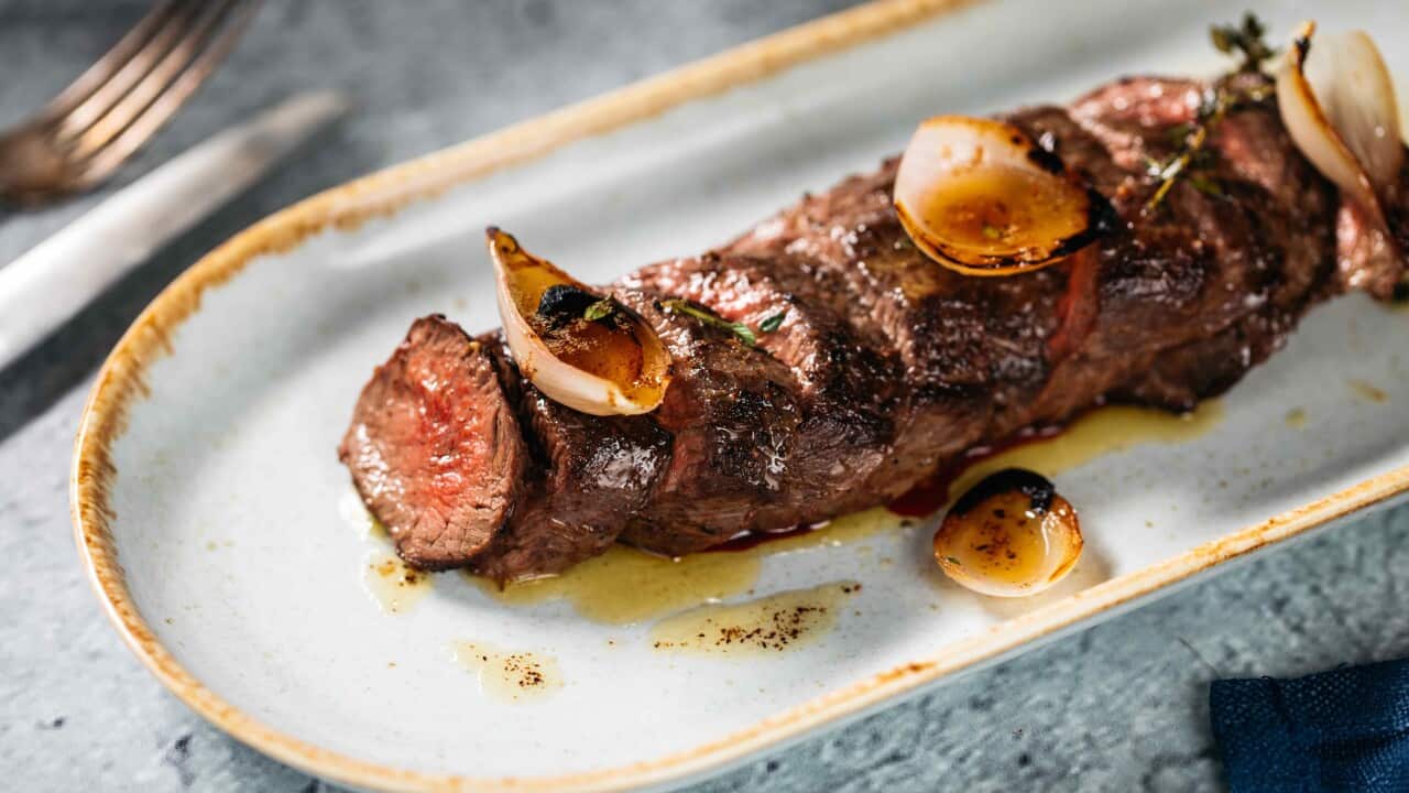 Charred venison and pickled onions