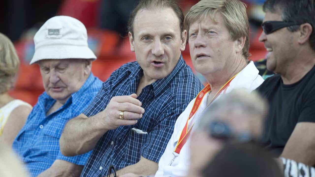 Gary Ablett senior (centre) is seen watching his son Gary play