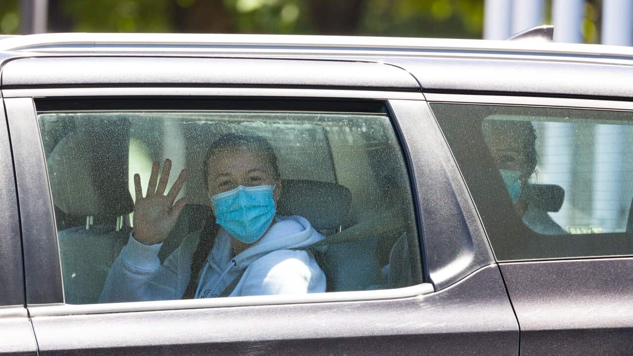 Ivana Popovic leaves her hotel for a practise tennis session