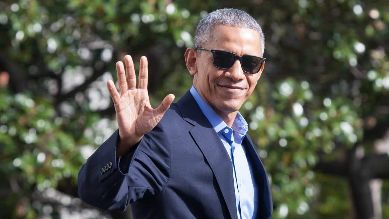 Barack Obama exits the White House.