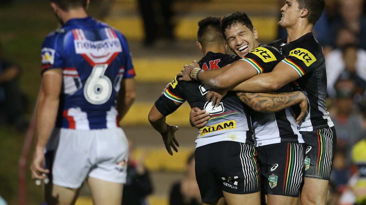 Dean Whare of the Panthers scores and celebrates