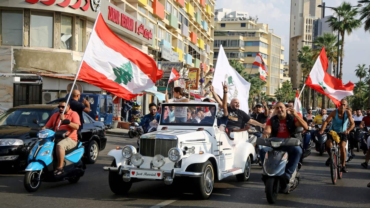 Protesters take to the streets on the eleventh day of anti-government rallies across Lebanon.