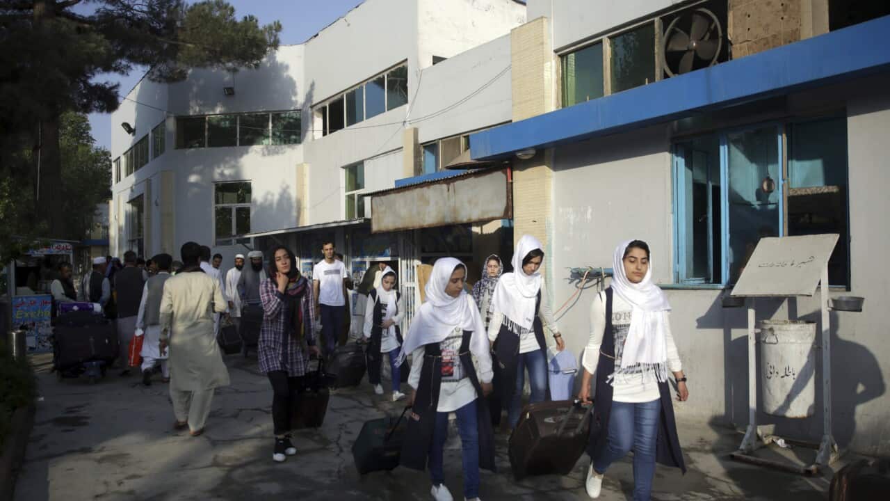 Members of a female robotics team from Herat province, leave Kabul to the U.S. from Kabul Airport, in Kabul, Afghanistan,