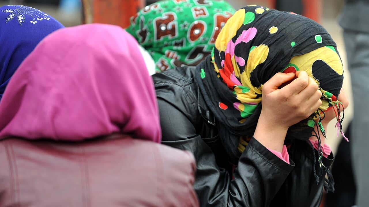 Women refugees near the town of Gaziantep in Turkey after crossing the border from Syria.