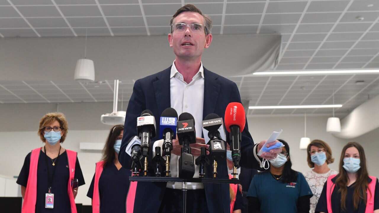 NSW Premier Dominic Perrottet speaks to the media during a press conference.