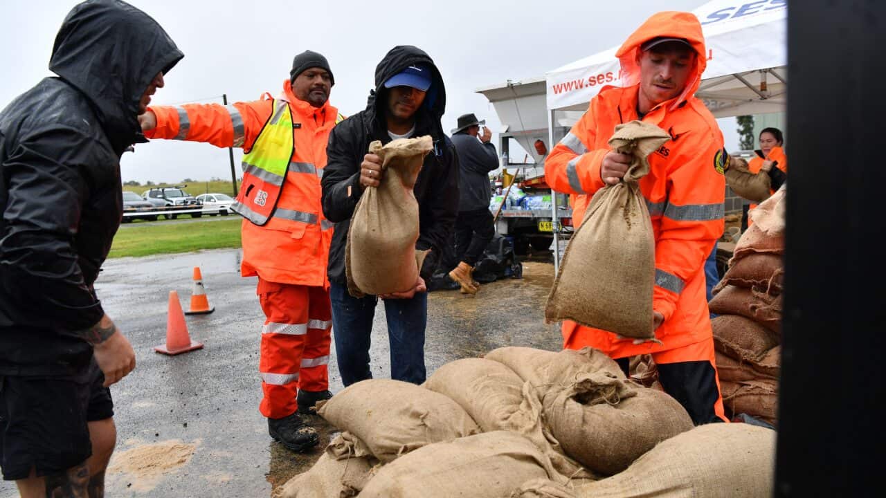 SES volunteers at Penrith SES making and providing free sandbags to residents, Sydney, Saturday, 20 March, 2021.