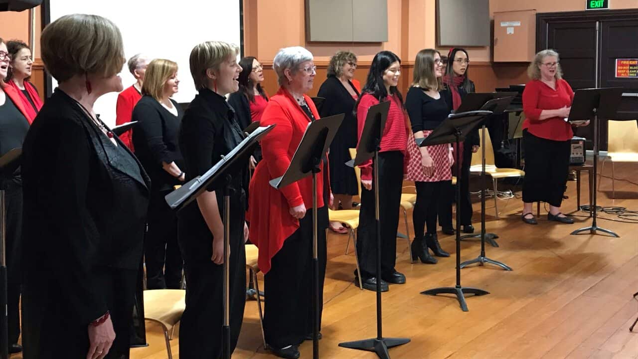 The choir performs together after months of online rehearsals