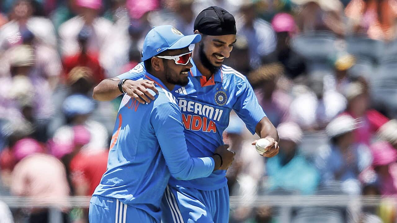 India's Arshdeep Singh and Sanju Samson celebrates the wicket of South Africa's van der Dussen