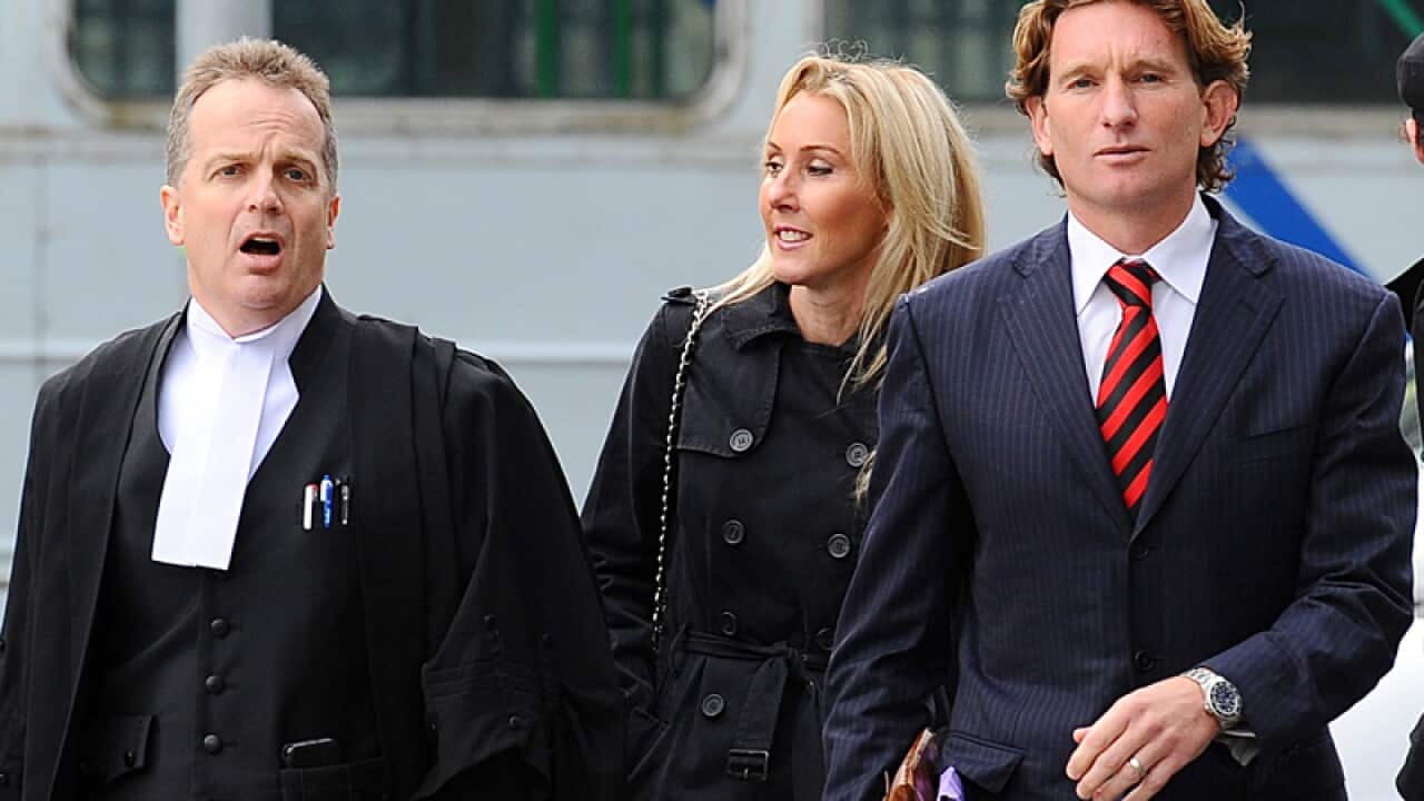 James Hird and lawyer arrive at court.