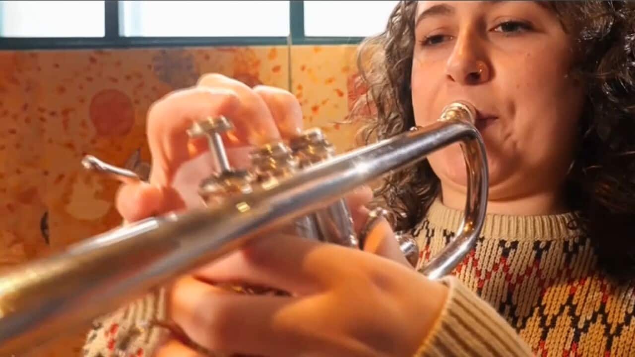 Musician Rebecca Toal plays the trumpet (AP).jpg