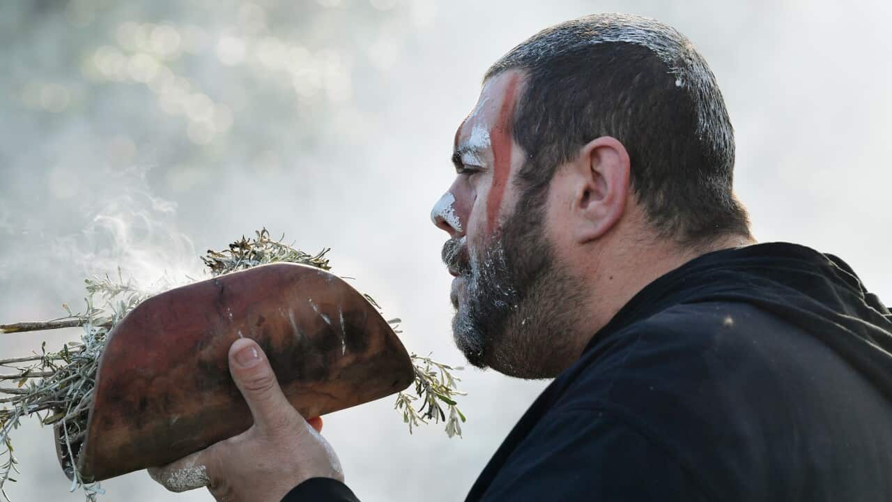 Cultural Bearer Allan Sumner is seen during a burial ceremony at Kingston Park in Adelaide, Thursday, August 1, 2019.