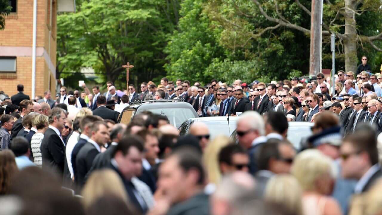 Mourners form a guard of honour in Macksville