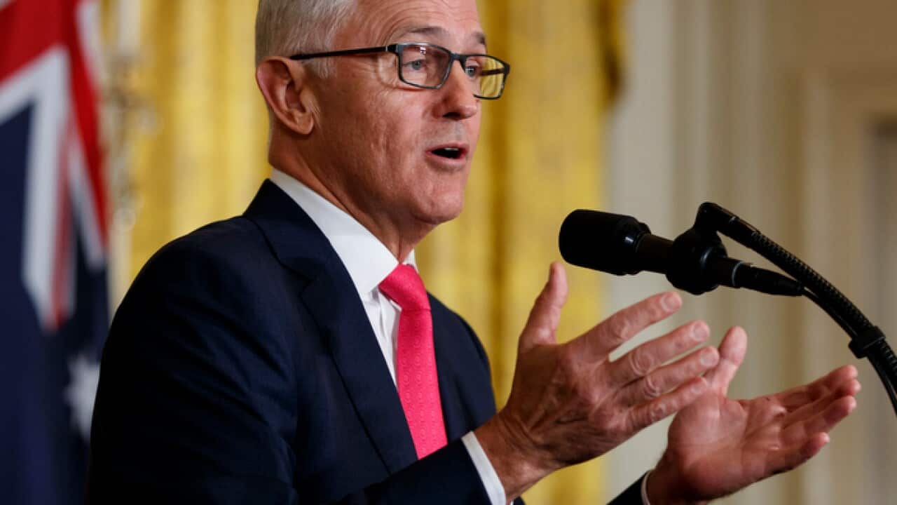 Australian Prime Minister Malcolm Turnbull speaks during a news conference with President Donald Trump in the East Room of the White House in Washington, Friday, Feb. 23, 2018. (AP Photo/Carolyn Kaster)