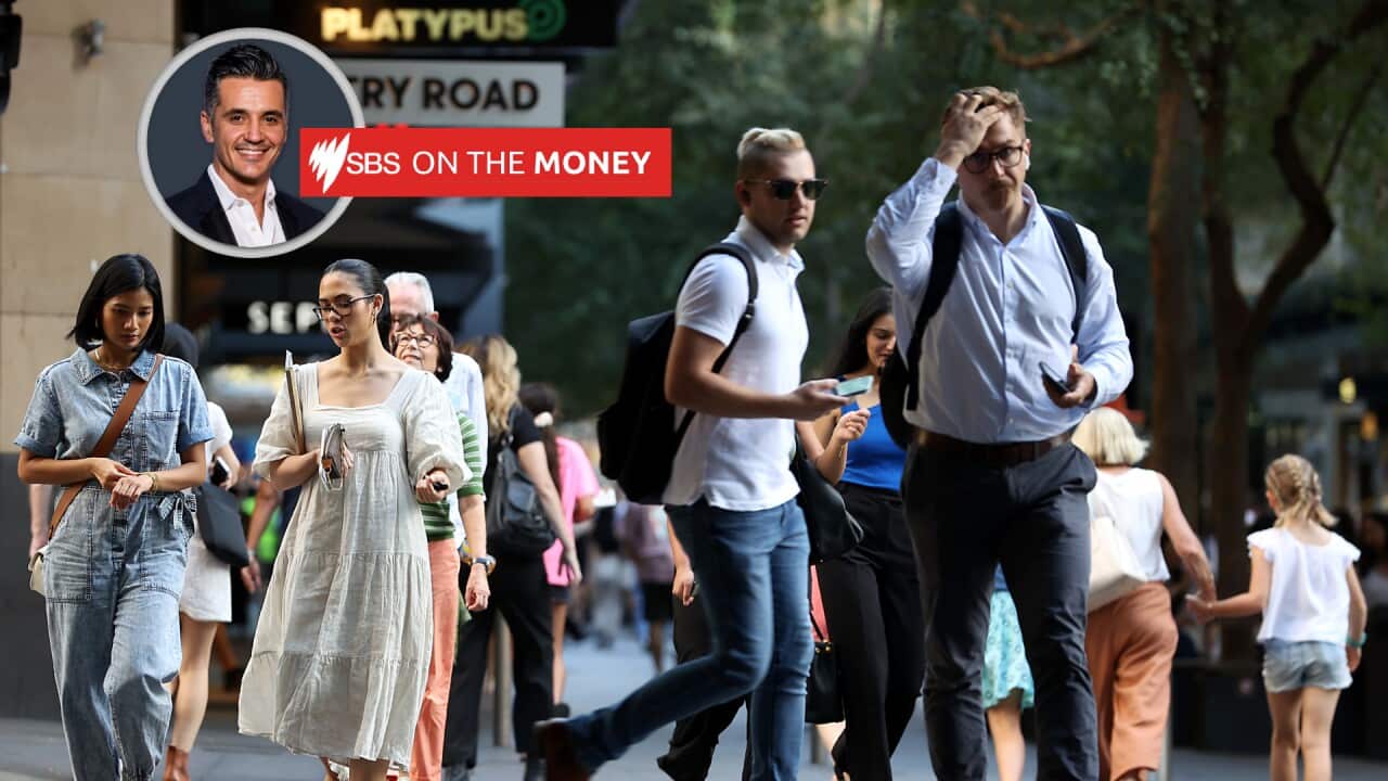 People walking by retail stores in the Sydney CBD.