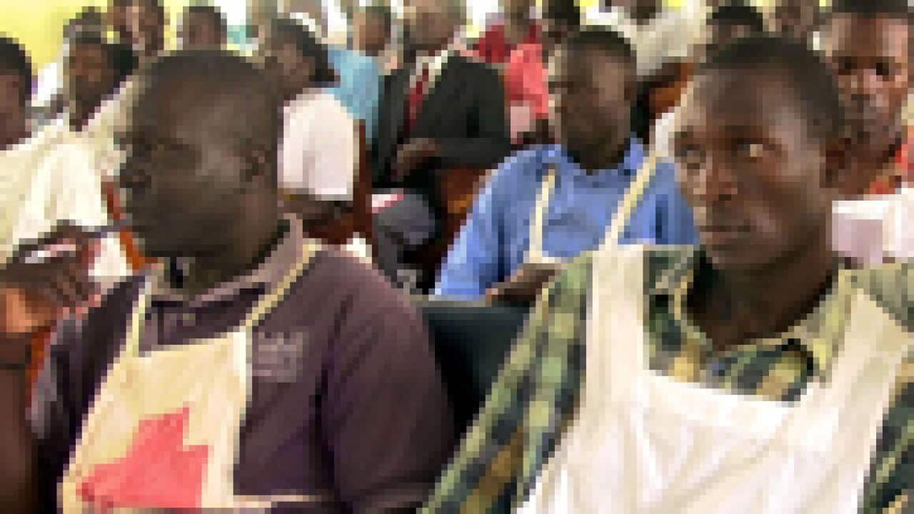 Health workers and Red Cross volunteers listen to a lecture about the ebola virus at Lacor Hospital in Gulu Uganda, 360 kilometers north of the Uganda