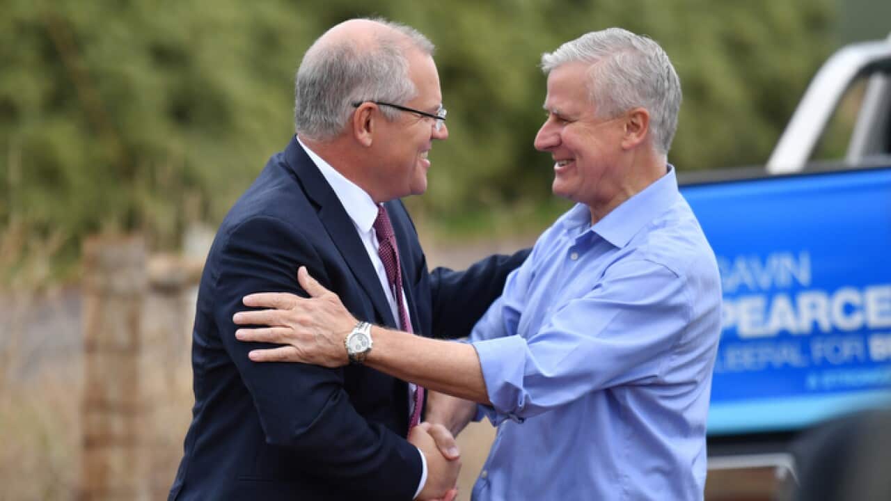Prime Minister Scott Morrison and Deputy Prime Minister Michael McCormack at Premium Fresh farm 9km west of Devonport in Tasmania, Wednesday, April 17, 2019. (AAP Image/Mick Tsikas) NO ARCHIVING