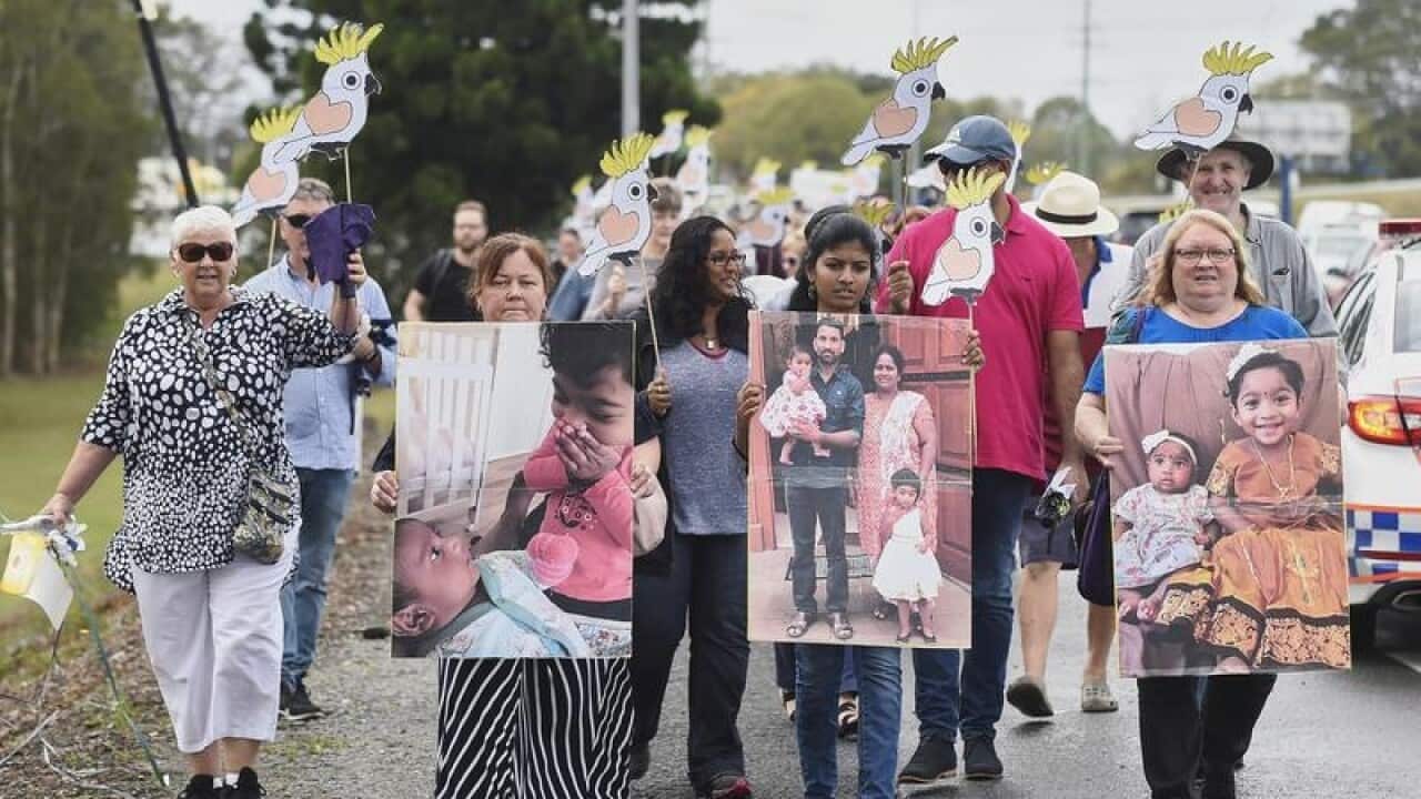 Friends of a family facing deportation head to Peter Dutton's office.
